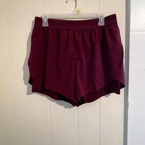 Burgundy shorts with built-in compression shorts